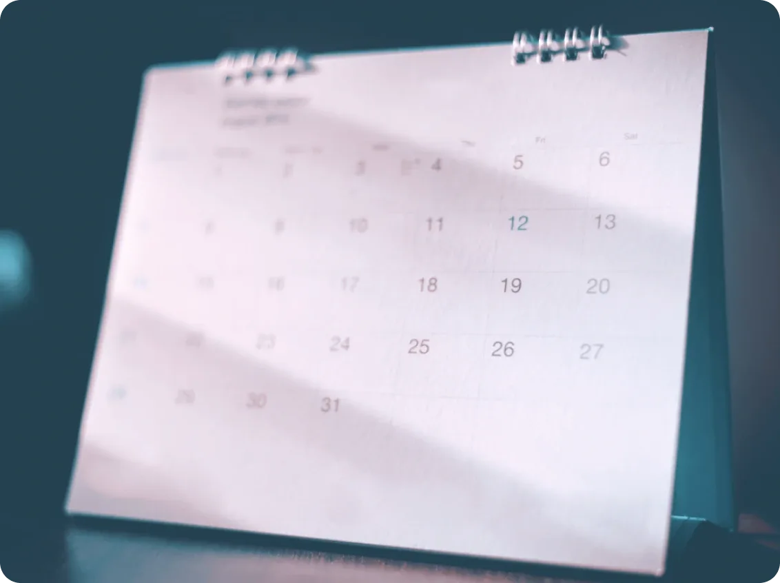 A standing calendar on a table