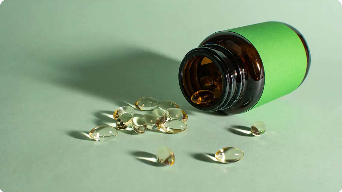 An open bottle of gel capsules