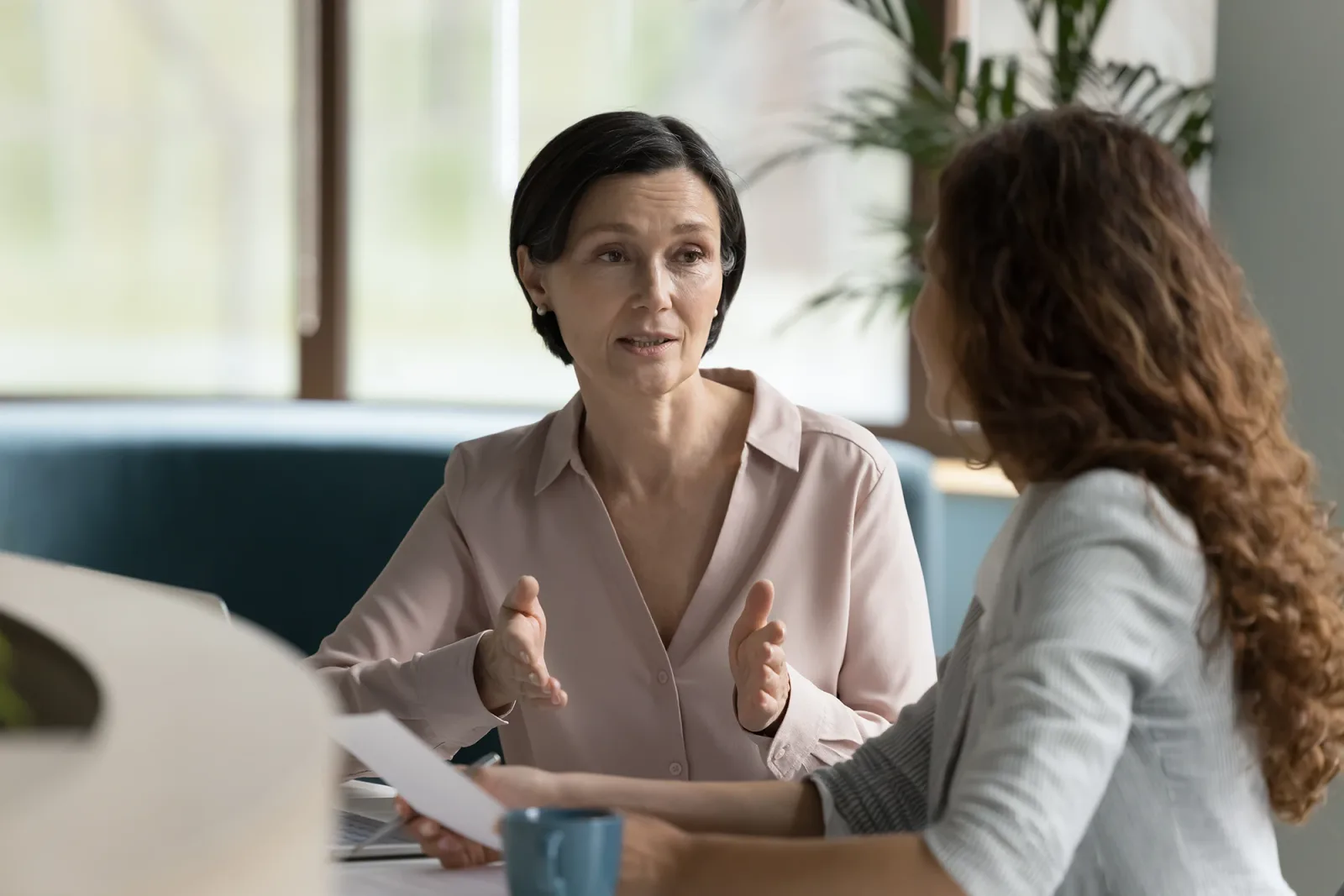 A woman talking with her doctor